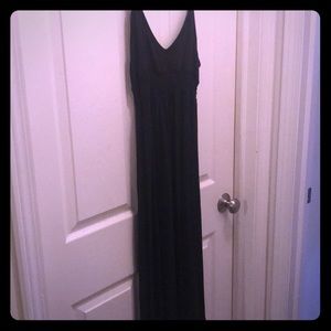 Black floor length maternity dress.
